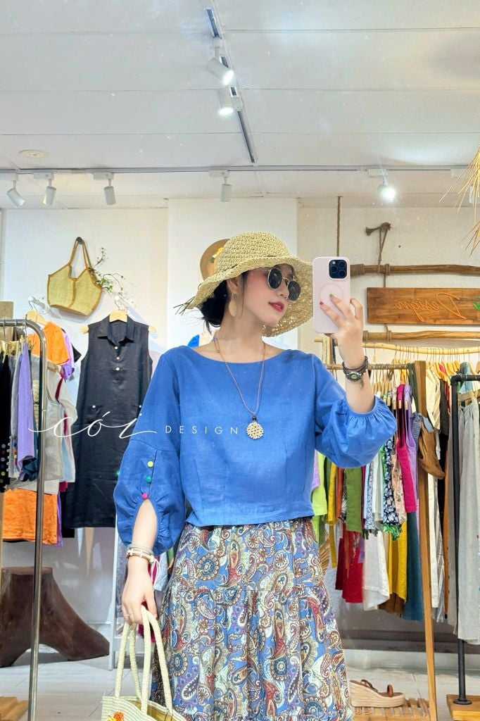 Áo tay phồng phối nơ lưng linen tưng premium Cói Design