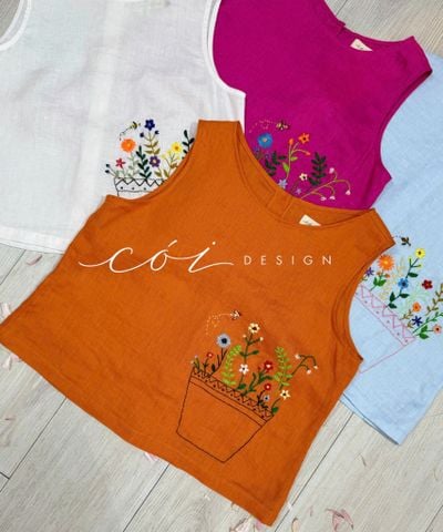 Áo nút bọc màu Vườn Hoa Trong Túi tưng premium Cói Design