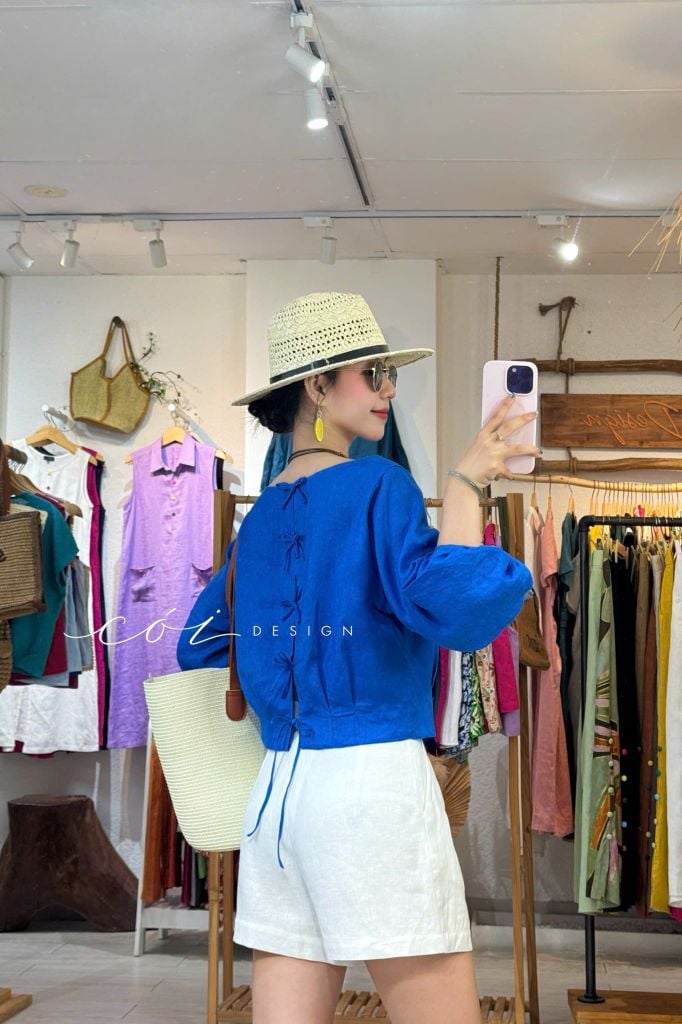 Áo tay phồng phối nơ lưng linen tưng premium Cói Design