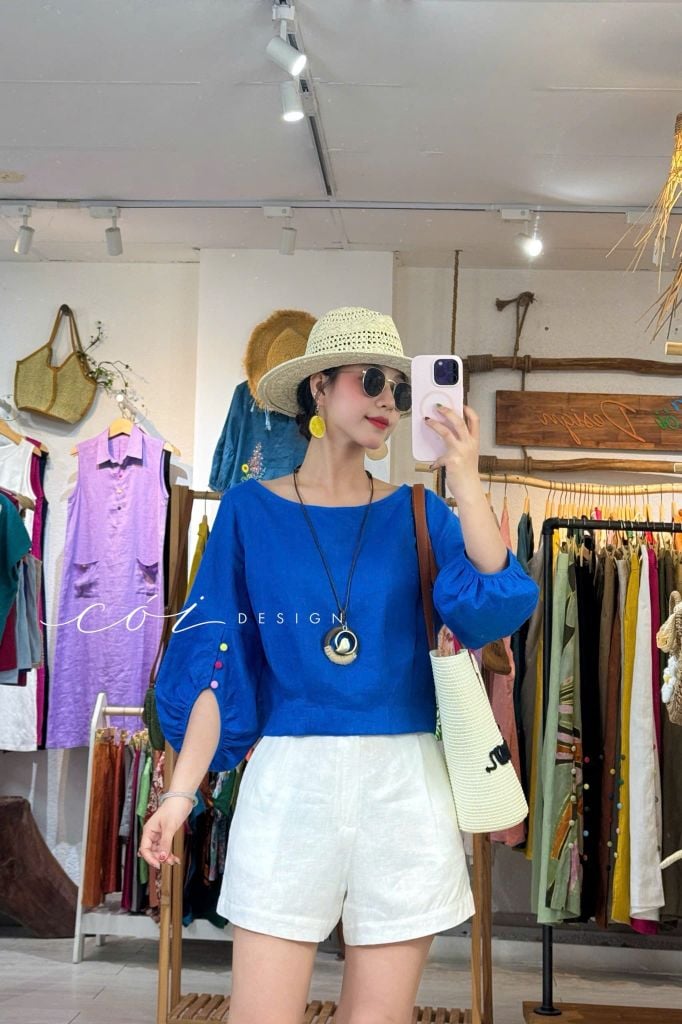Áo tay phồng phối nơ lưng linen tưng premium Cói Design