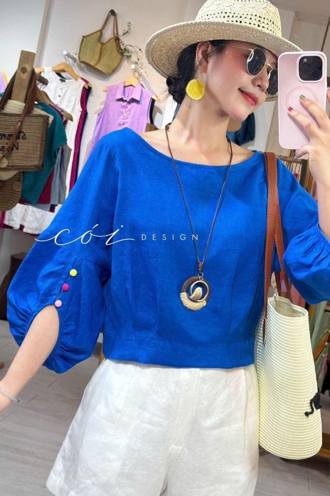 Áo tay phồng phối nơ lưng linen tưng premium Cói Design