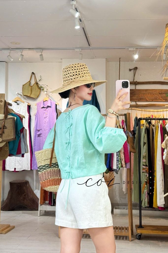 Áo tay phồng phối nơ lưng linen tưng premium Cói Design