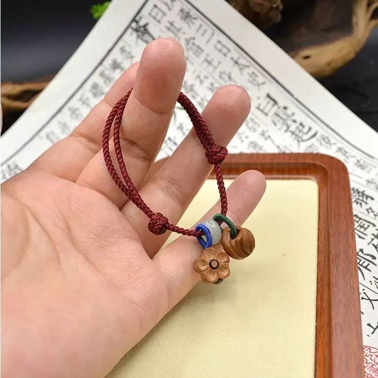  Vòng Tay Hoa Đào Gỗ 