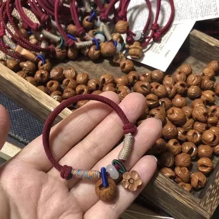  Vòng Tay Hoa Đào Gỗ 