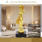 Tượng Cô gái Việt Nam mặc áo dài mạ vàng