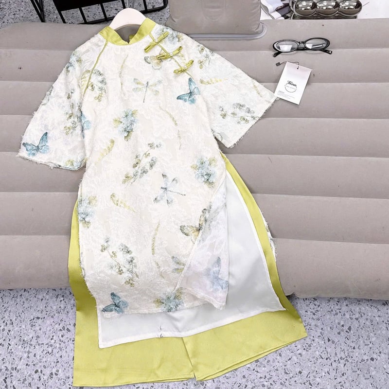 Bộ áo dài bé gái vân lông vũ