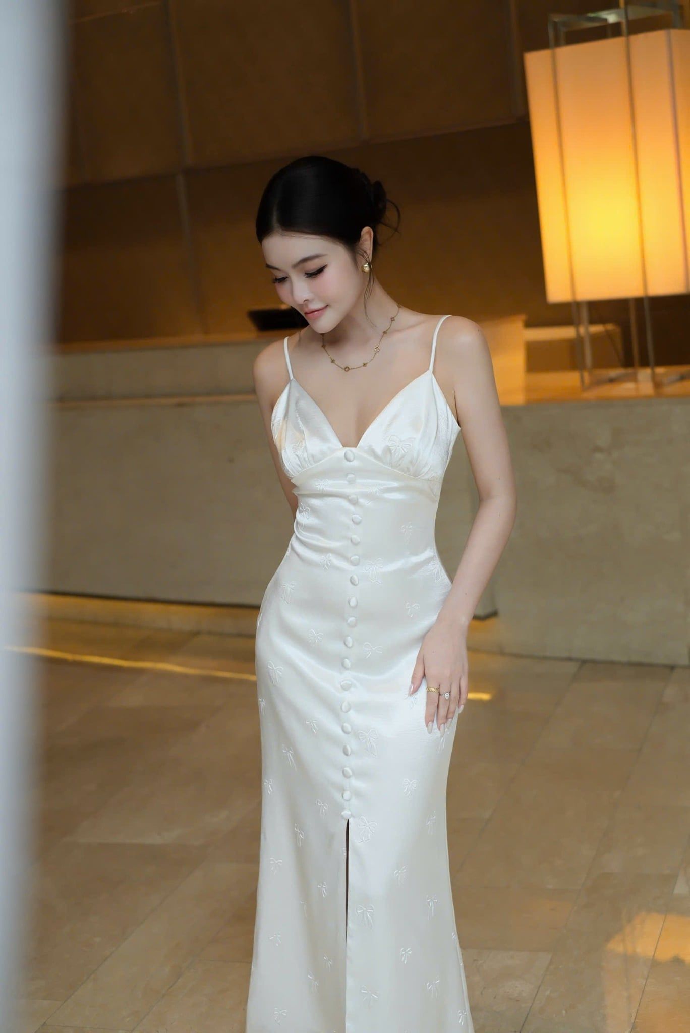 Đầm Lụa Nơ Nổi Nút Bọc