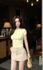Áo Thun Tay Con Viền Nút