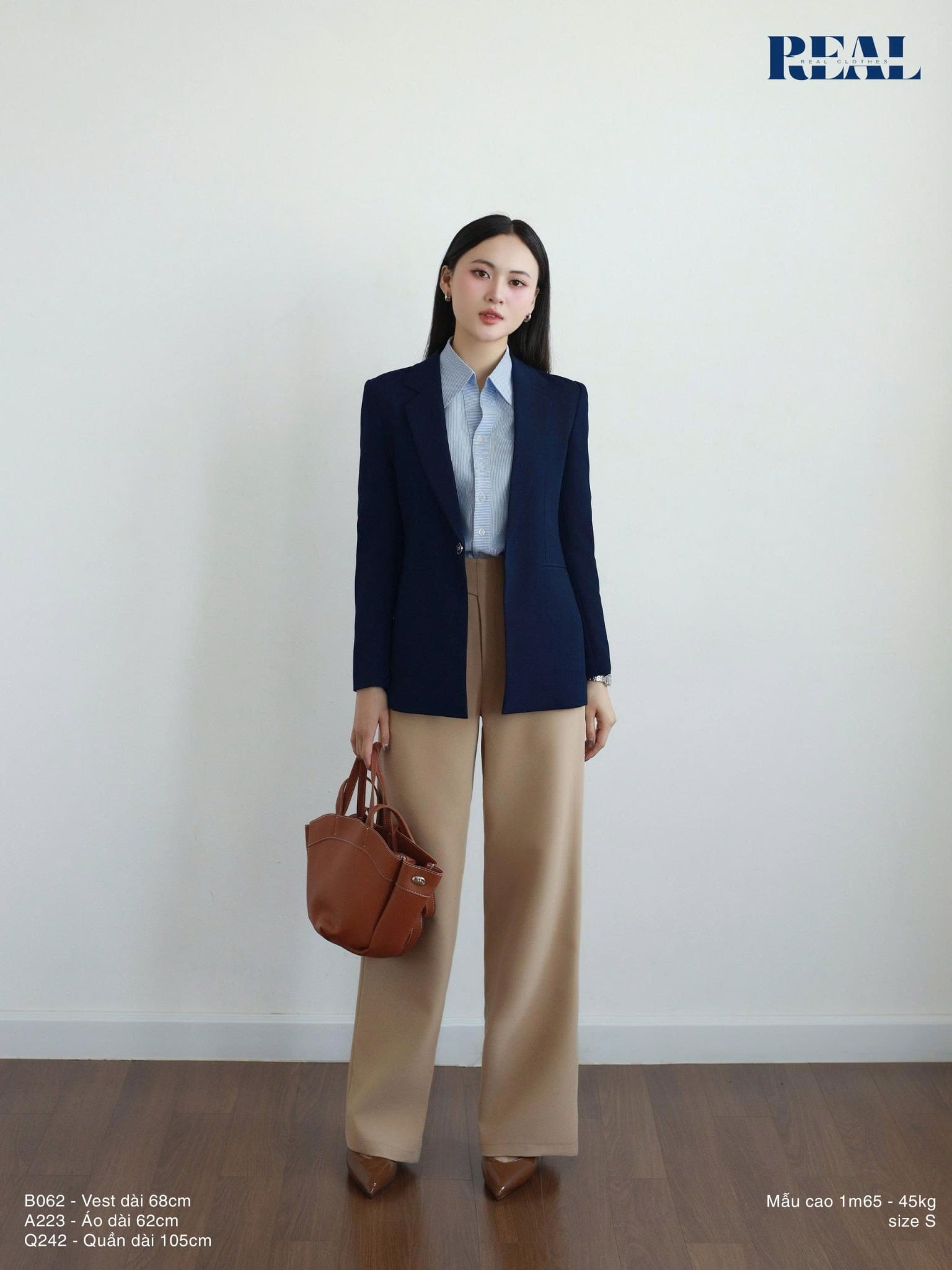 Sơ mi cổ V tay dài sọc xanh