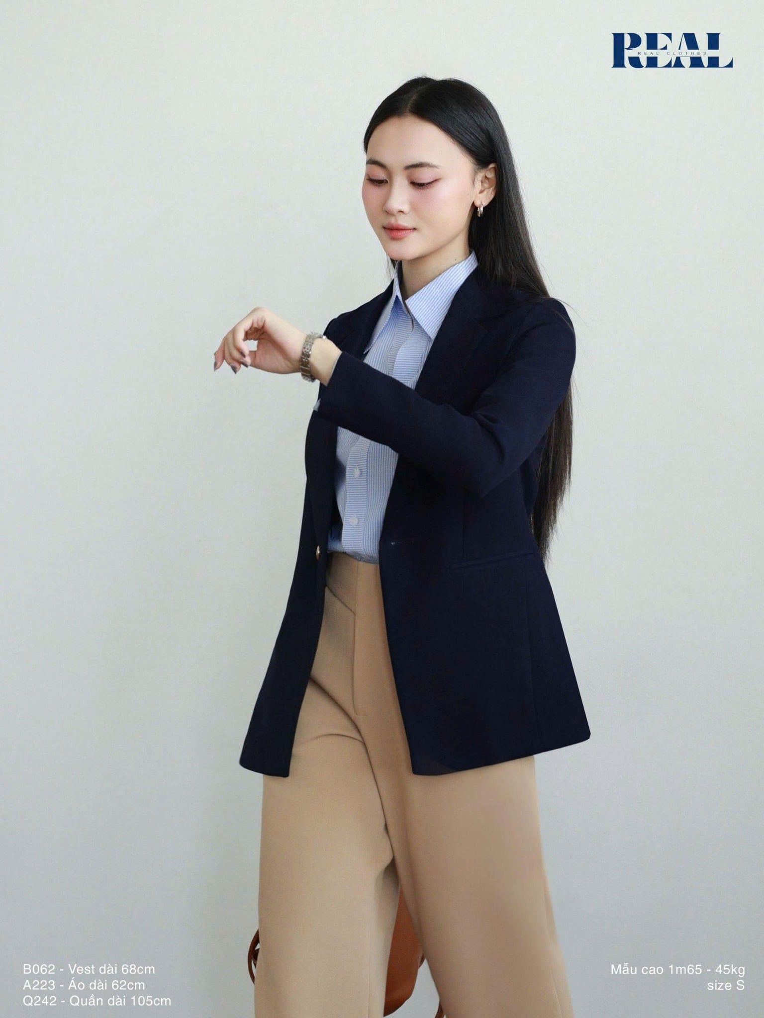 Sơ mi cổ V tay dài sọc xanh