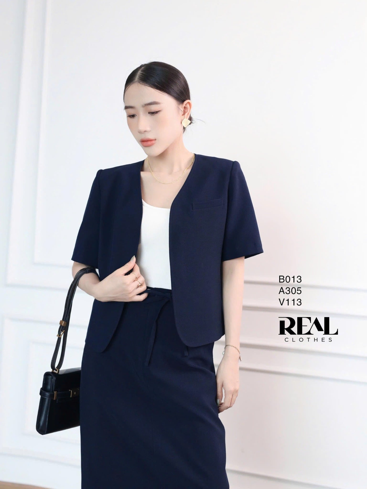 Vest Sunny xanh đen