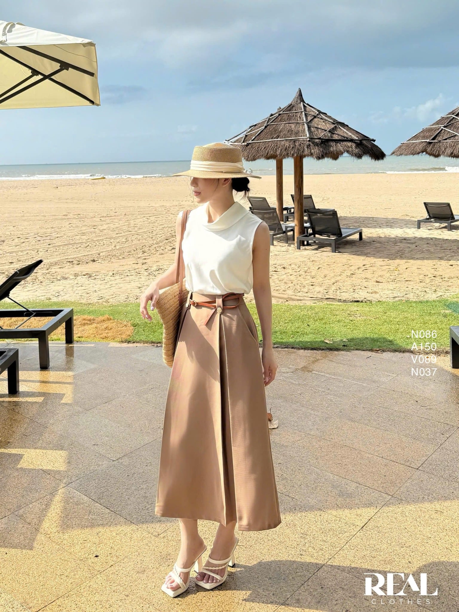 Váy 2 xếp nút cà phê sữa SALE