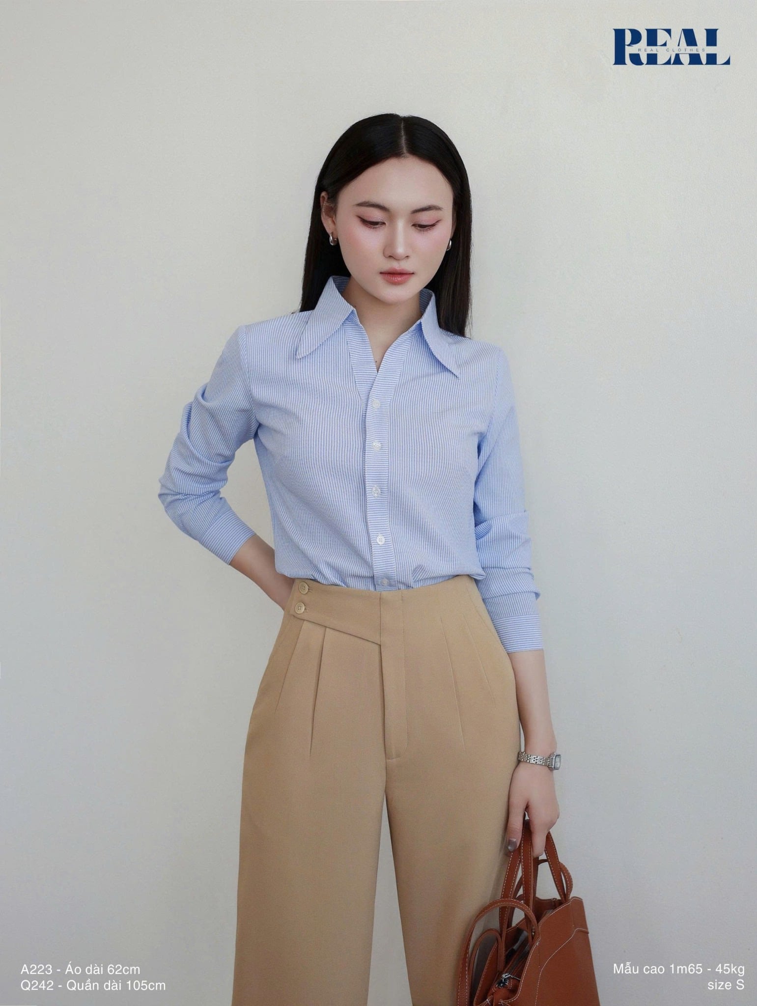 Sơ mi cổ V tay dài sọc xanh