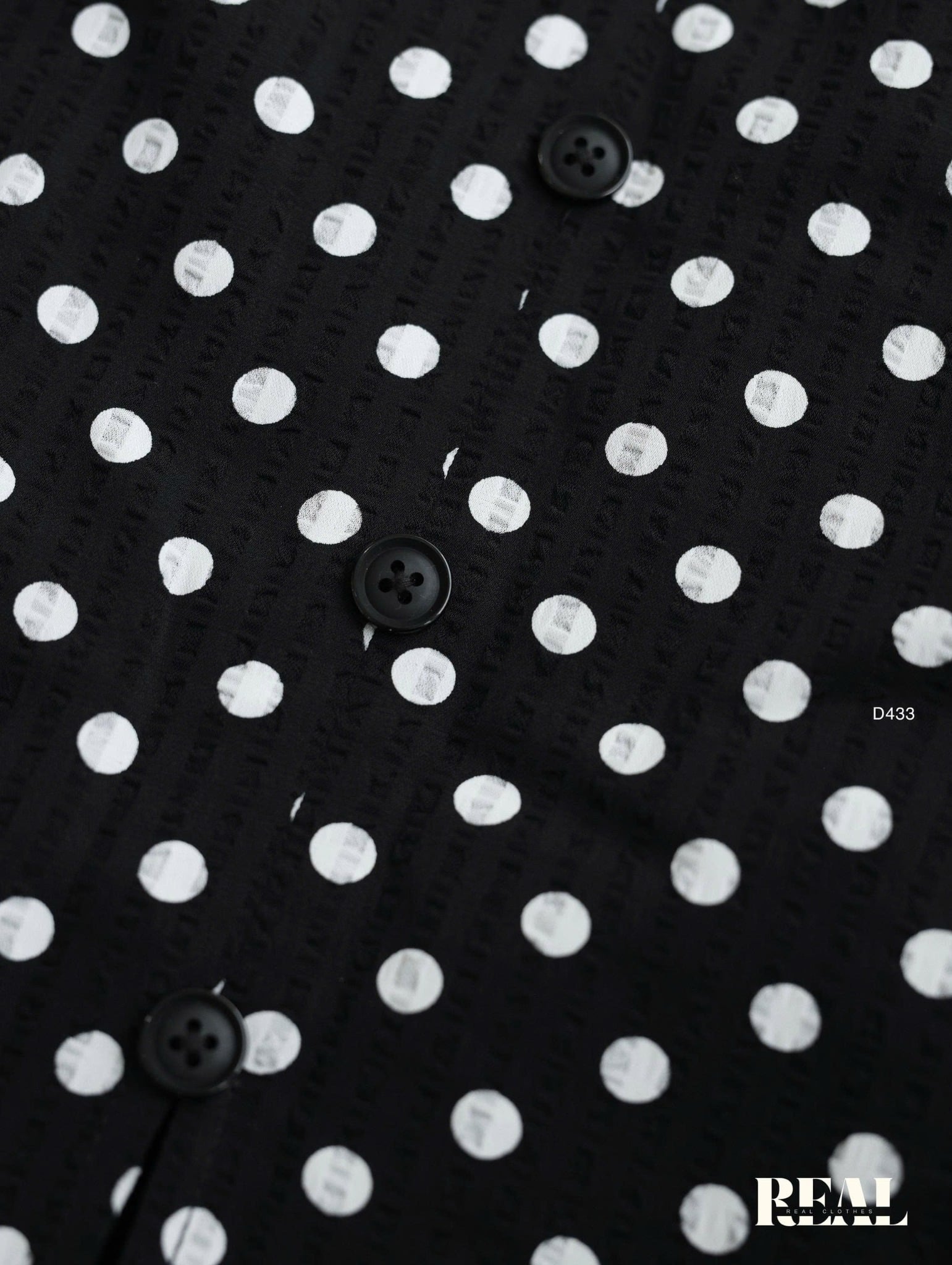 Đầm chéo chấm bi xốp đen