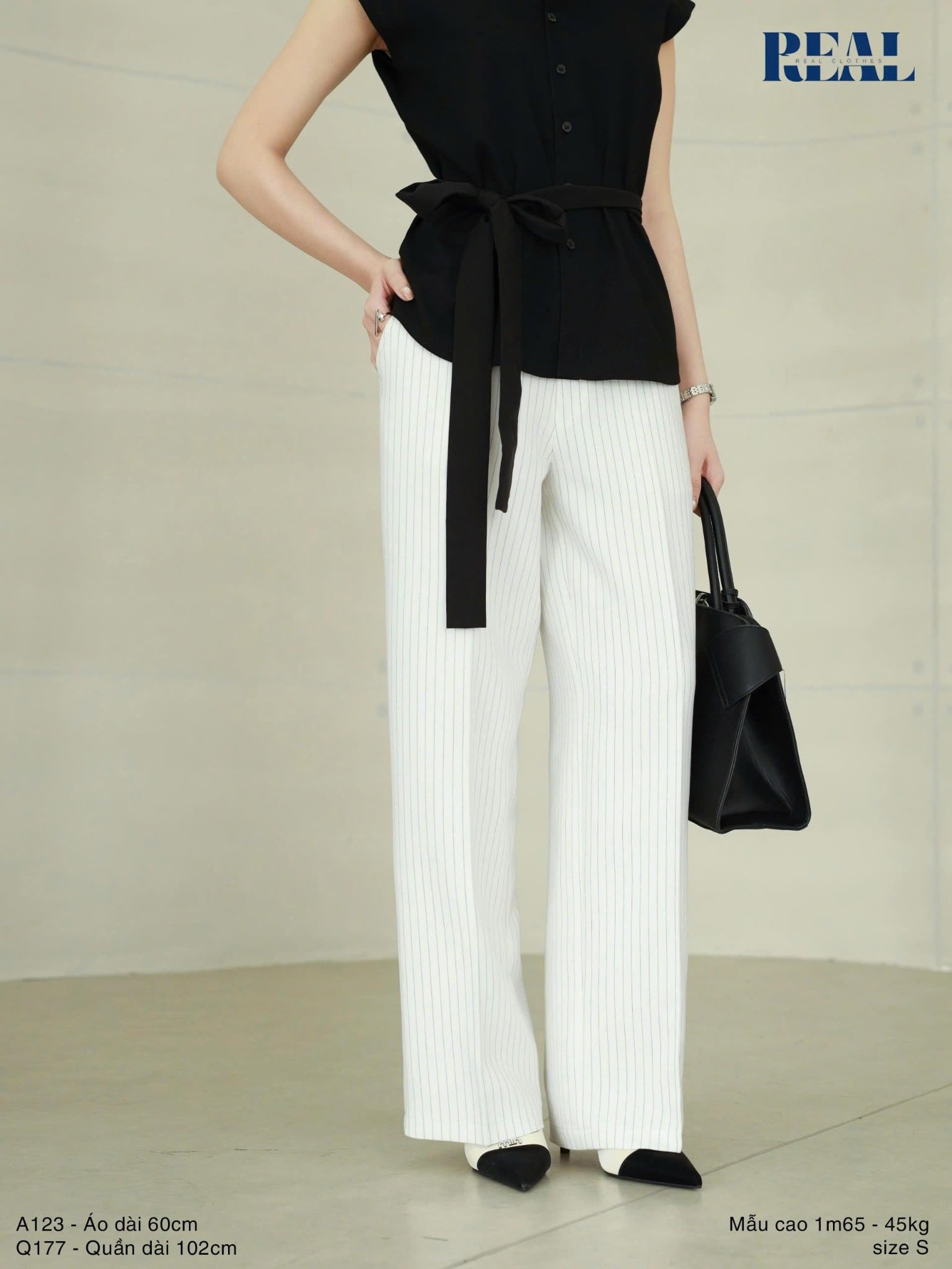 Sơ mi tay liền linen đen