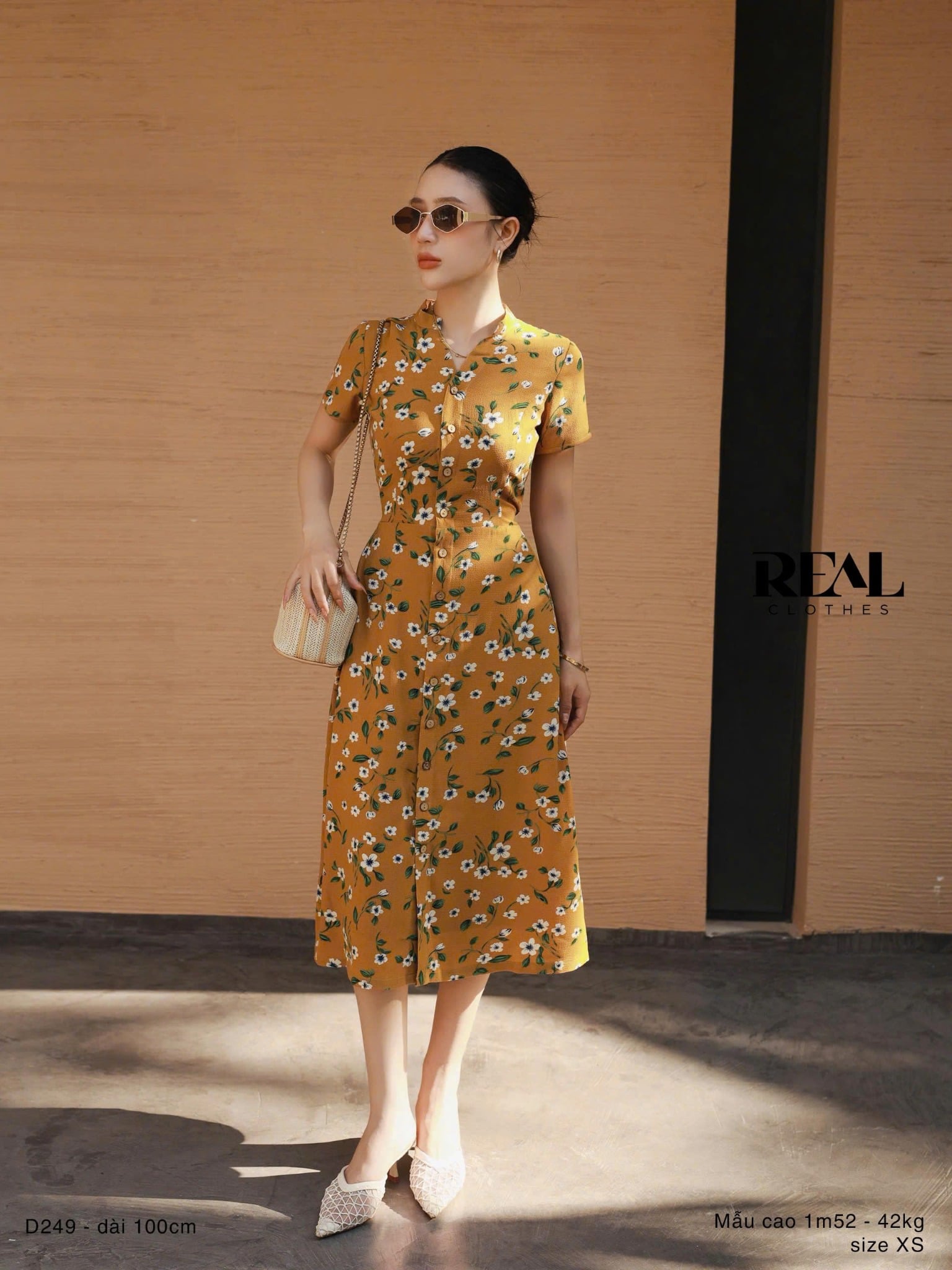 Đầm cổ trụ hoa vàng SALE