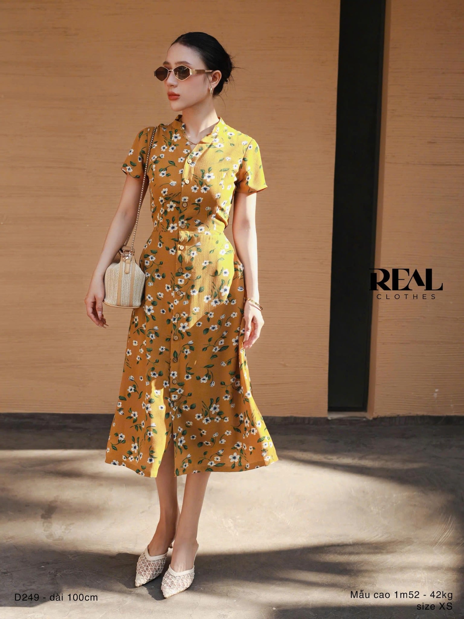 Đầm cổ trụ hoa vàng SALE