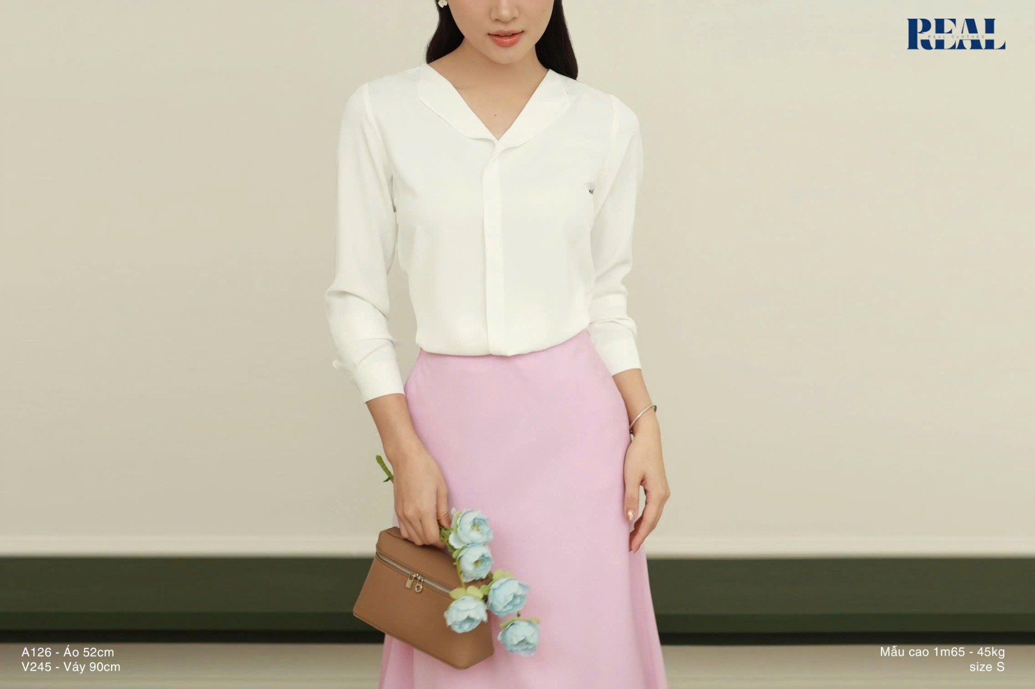 Áo cổ lật trắng