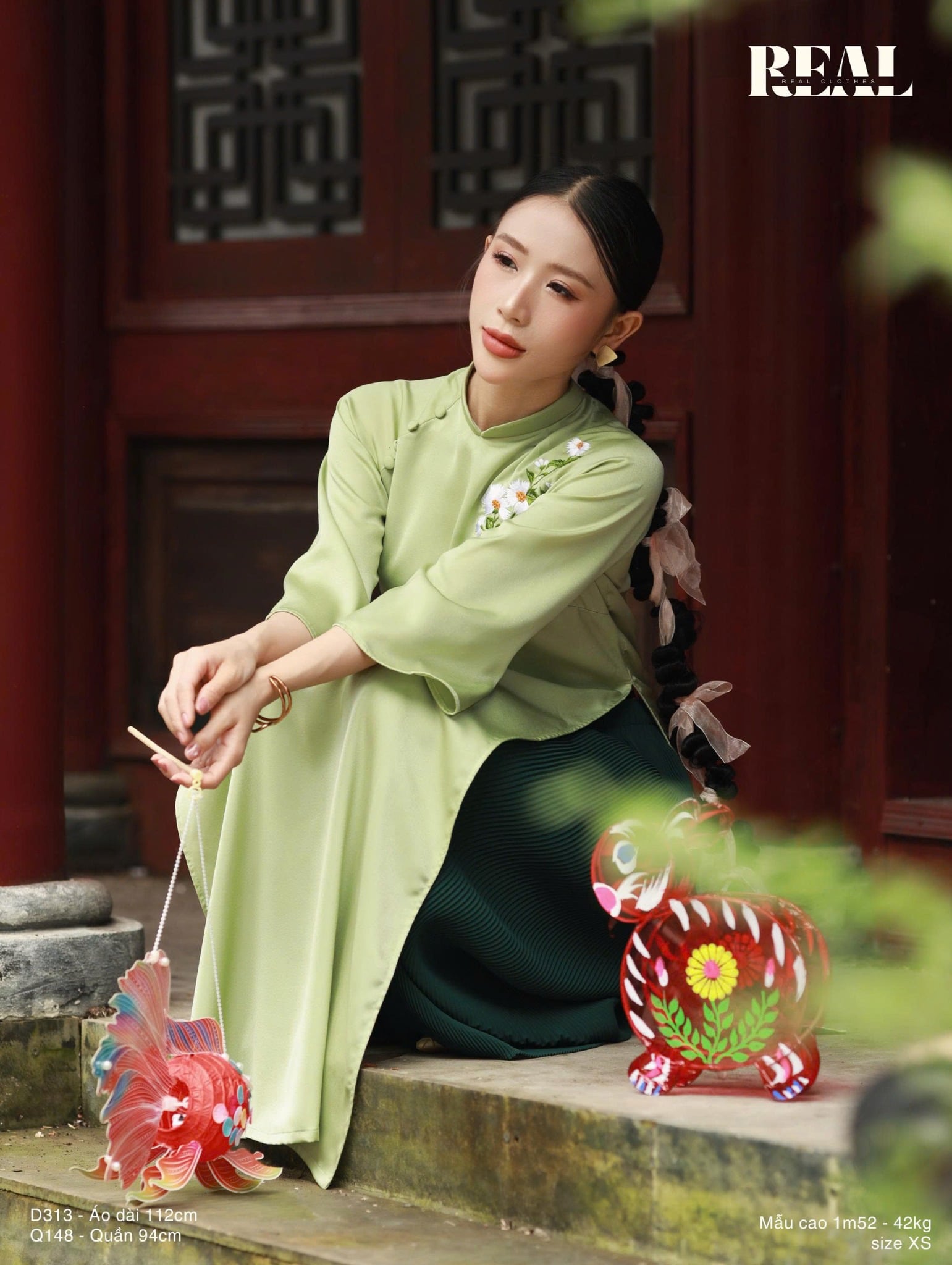 Áo dài cách tân Vivi xanh lá hoa