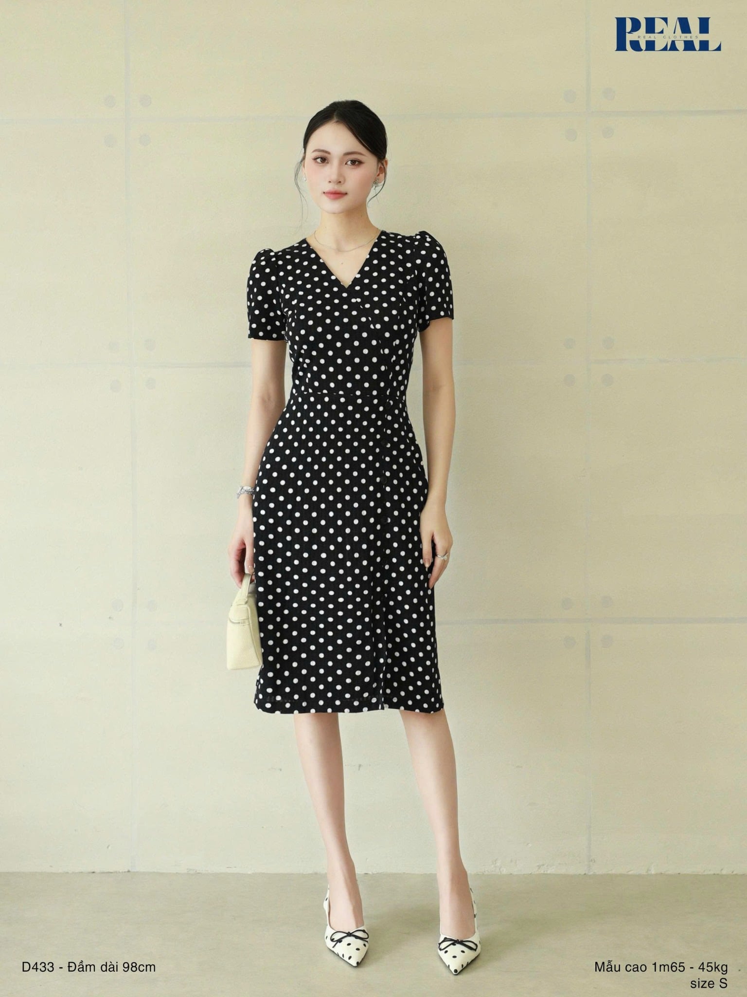  Đầm chéo chấm bi xốp đen 