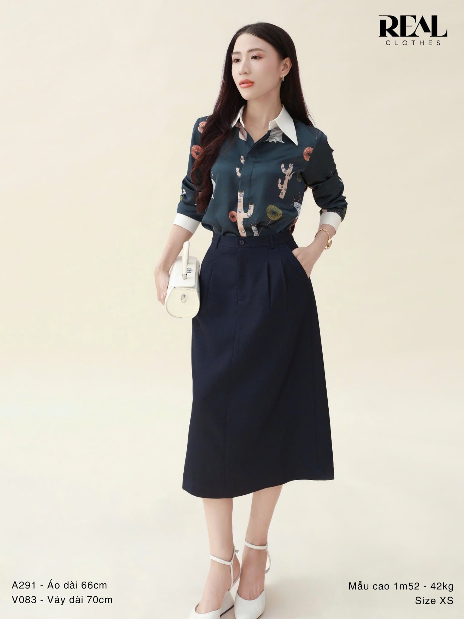  Váy 2 xếp xanh đen 