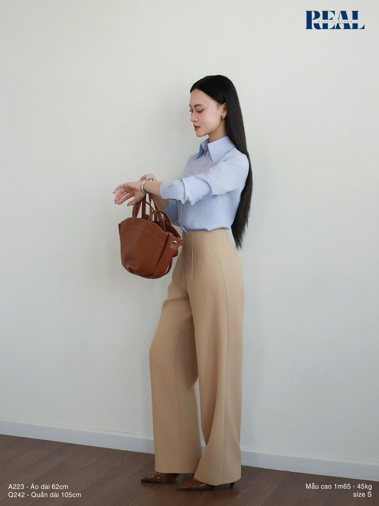 Sơ mi cổ V tay dài sọc xanh