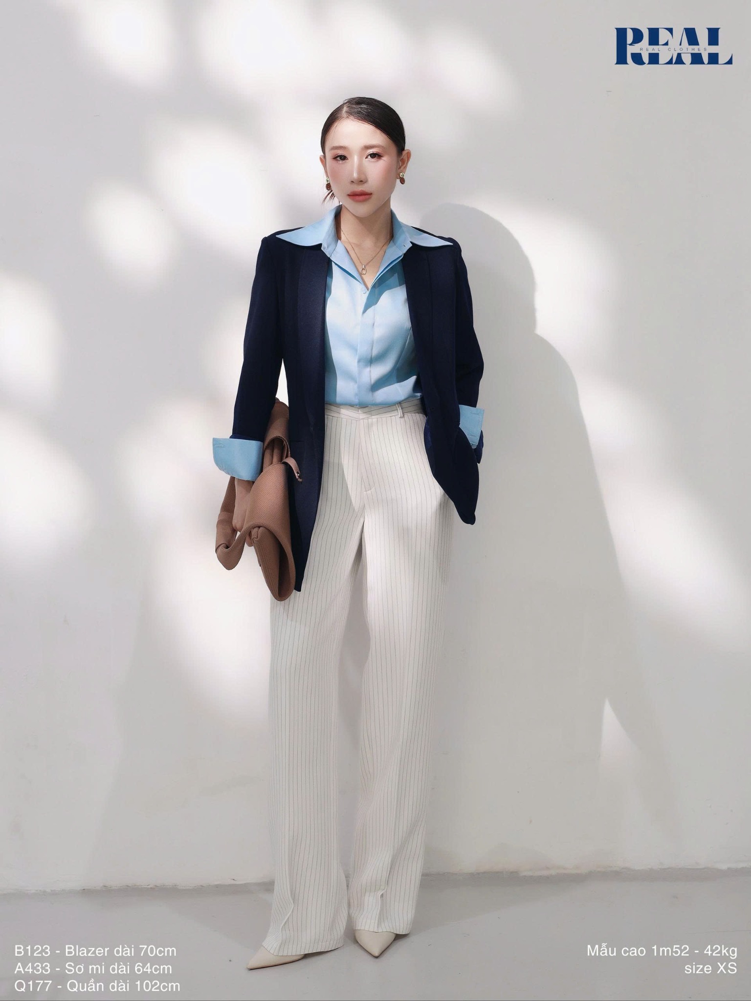 Sơ mi chít eo sọc tăm blue