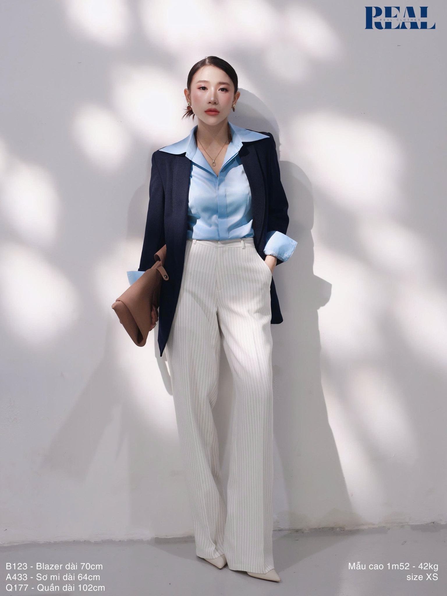 Sơ mi chít eo sọc tăm blue