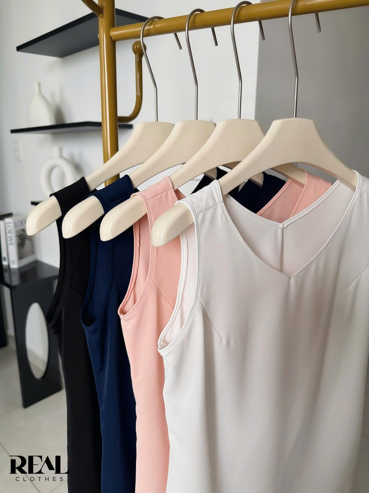 Áo cổ tim xanh đen không tay