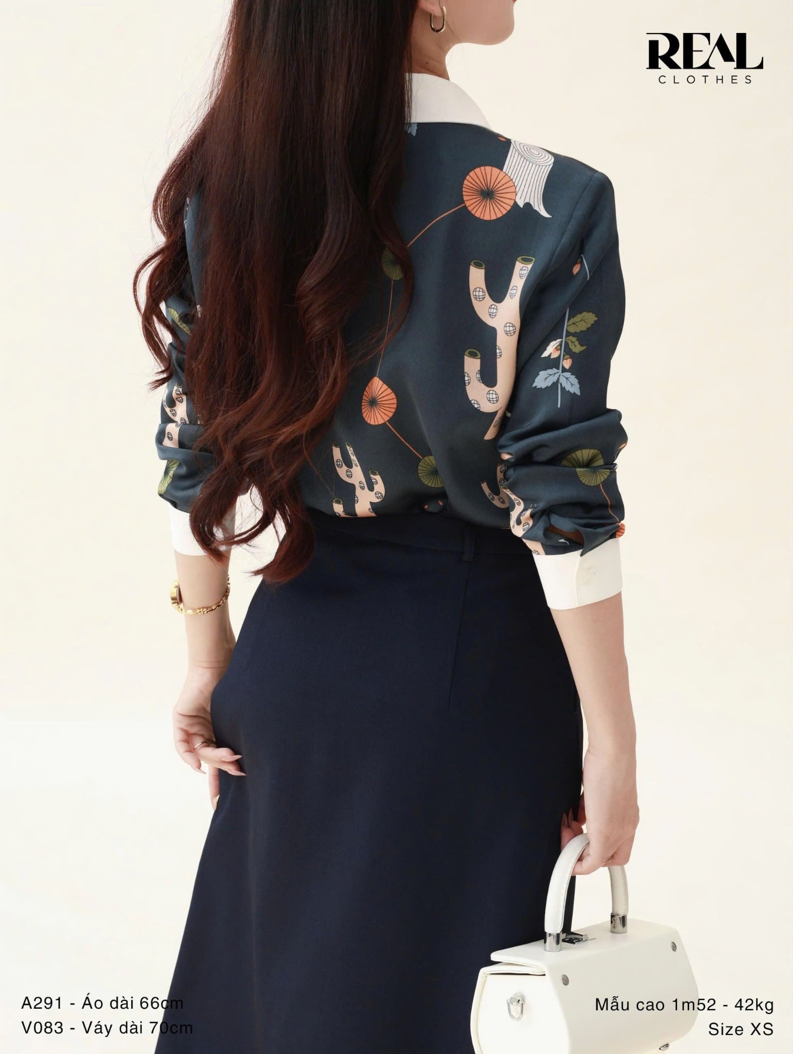 Váy 2 xếp xanh đen