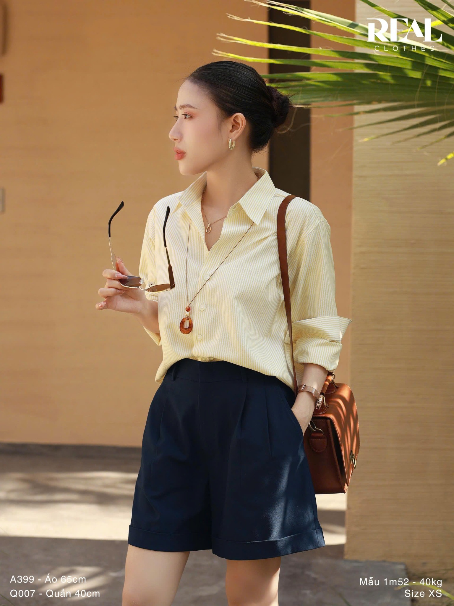 Sơ mi form rộng sọc vàng