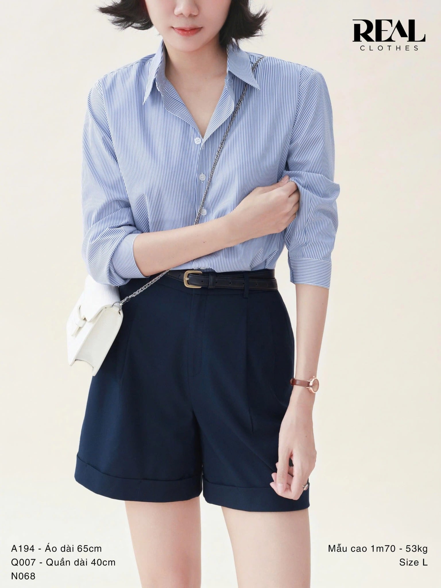  Quần short lật lai xanh đen 