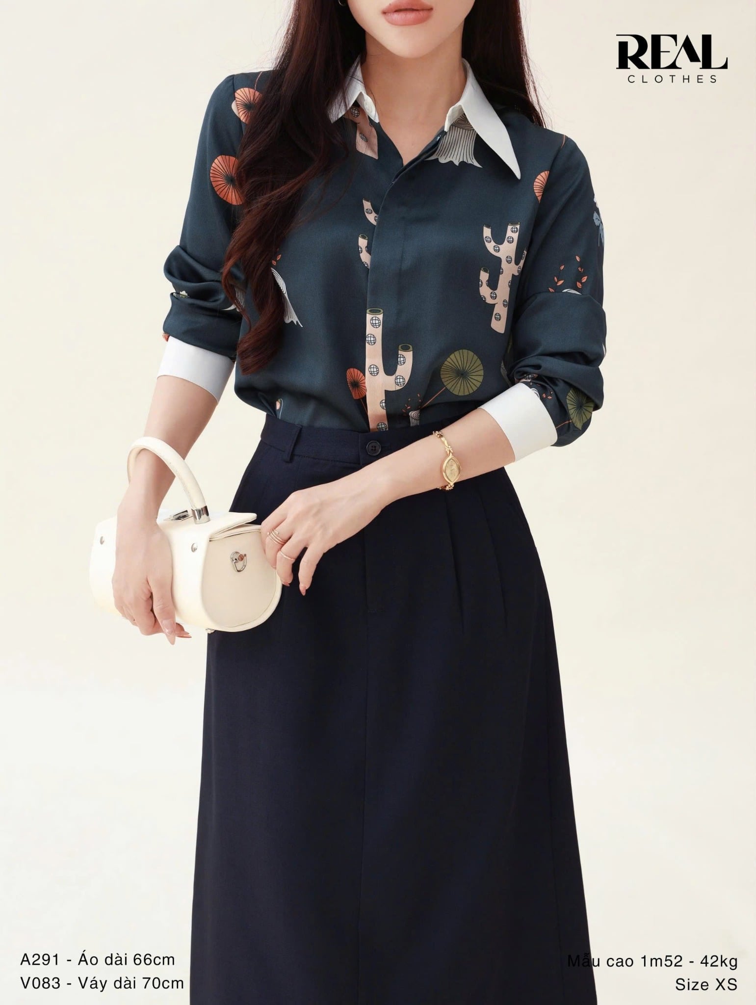 Váy 2 xếp xanh đen