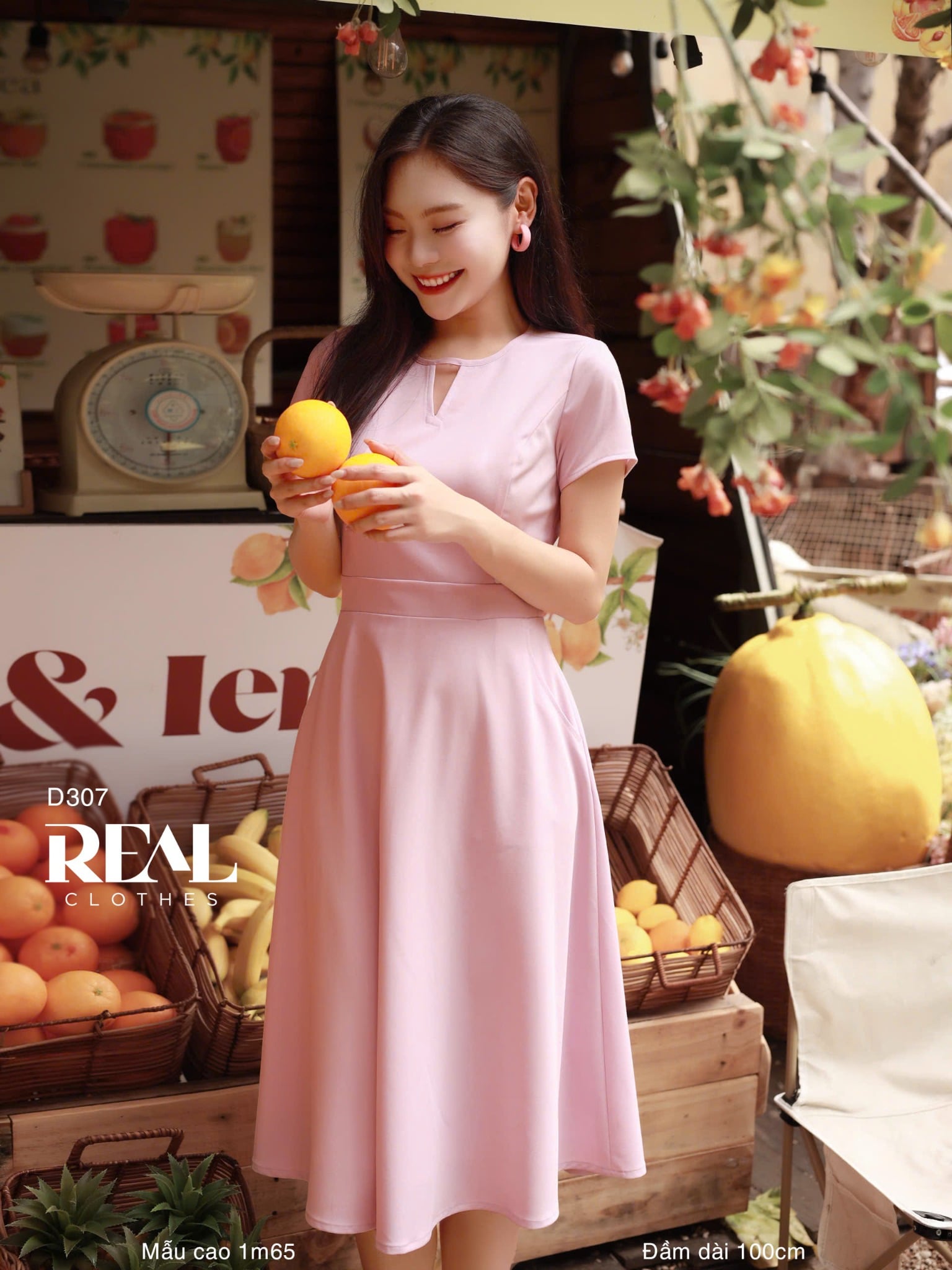 Đầm cổ tròn cách điệu