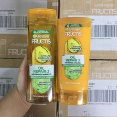 Dầu gội xả Garnier Fructics Oil Repair 3 từ Bơ và tinh dầu dừa, oliu