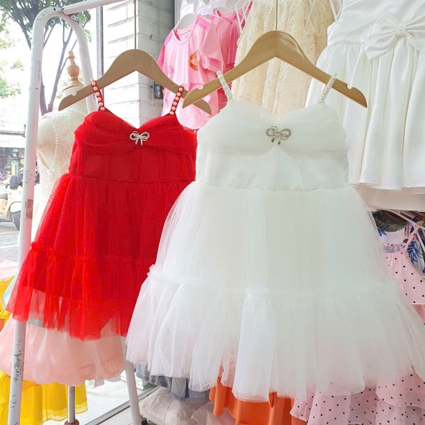  CC13 _ Đầm công chúa thiết kế cho bé mặc đi lễ tiệc 2 dây đính ngọc trai nhúng nơ trước ngực đẹp lung linh _ Beekids 