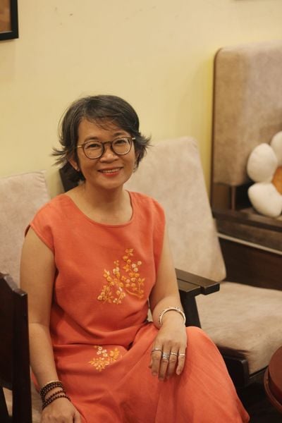  Đầm Oreno cam thêu tay Hồng Mai 