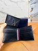 Ví Ngang Tommy Hilfiger Đen Sọc Hai Chỉ - New - 31HP220149