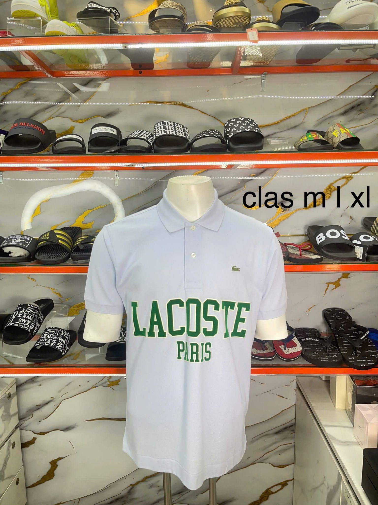Áo Polo Lacoste Xanh Nhạt Chữ Xanh Lá - New - PH7419 51 J2G - TD05
