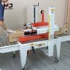 Máy Dán Thùng Carton Tự Động New Date – Giải Pháp Dán Băng Keo Thùng Carton 2 Mặt Cho Dây Chuyền Đóng Gói