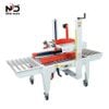 Máy Dán Thùng Carton Tự Động New Date – Giải Pháp Dán Băng Keo Thùng Carton 2 Mặt Cho Dây Chuyền Đóng Gói
