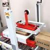Máy Dán Thùng Carton Tự Động New Date – Giải Pháp Dán Băng Keo Thùng Carton 2 Mặt Cho Dây Chuyền Đóng Gói