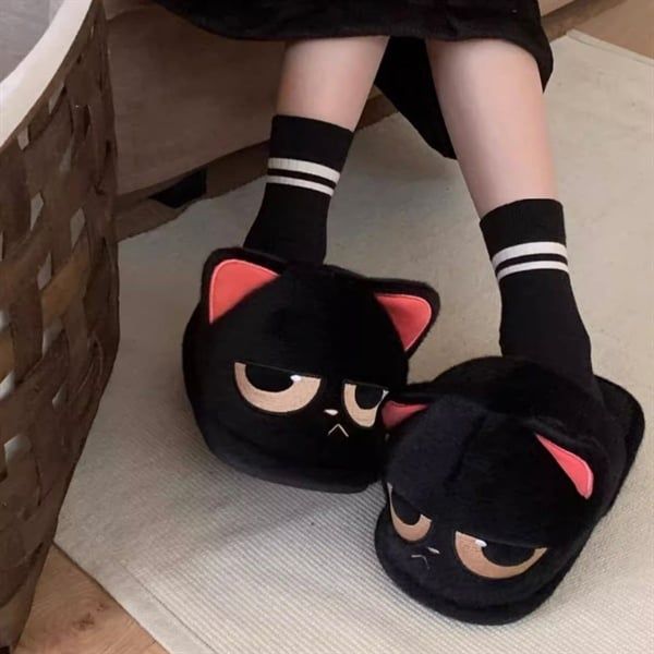  Dép lông mèo mun mặt xị 