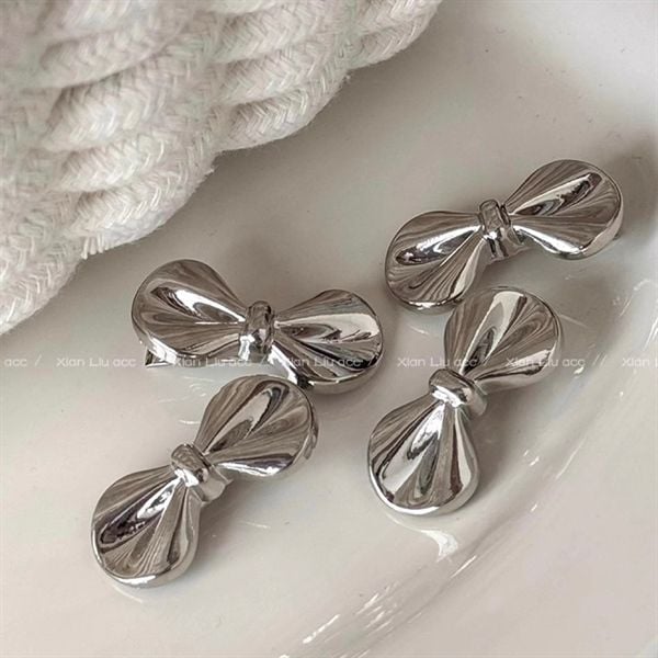  Kẹp tóc nơ bạc mini 