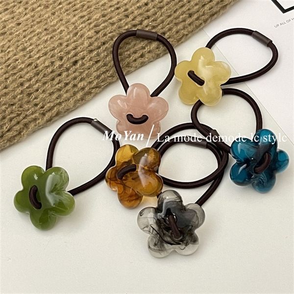  Chun buộc tóc hoa đá loang 