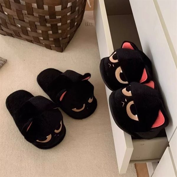  Dép lông mèo mun mặt xị 