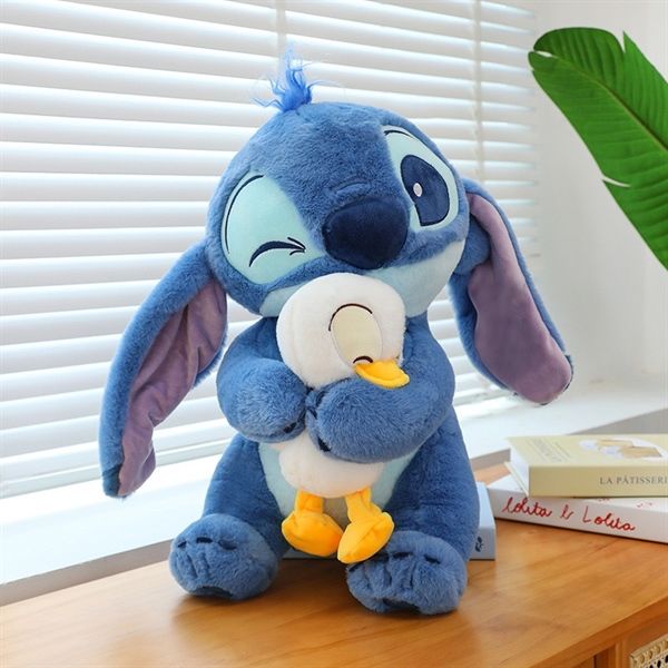  Stitch bông ôm vịt 40cm 