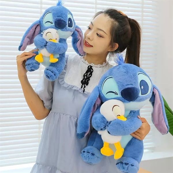  Stitch bông ôm vịt 40cm 