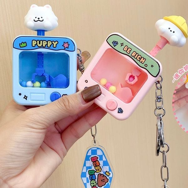  Móc khoá game cún gắp bóng 