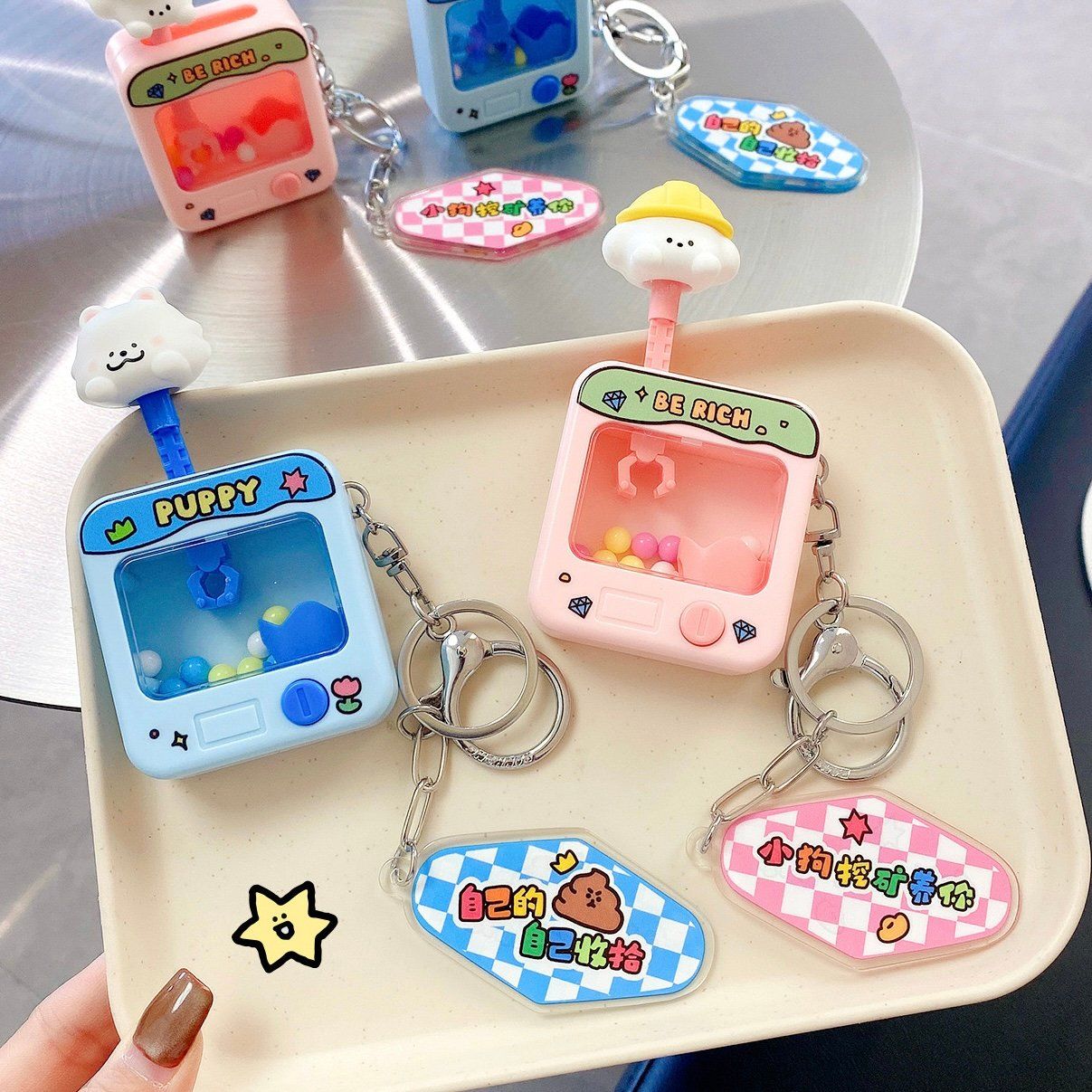  Móc khoá game cún gắp bóng 